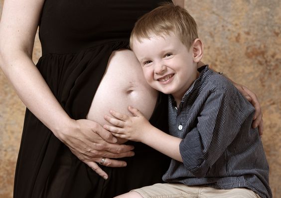 Babybauch mit Kind Kiel